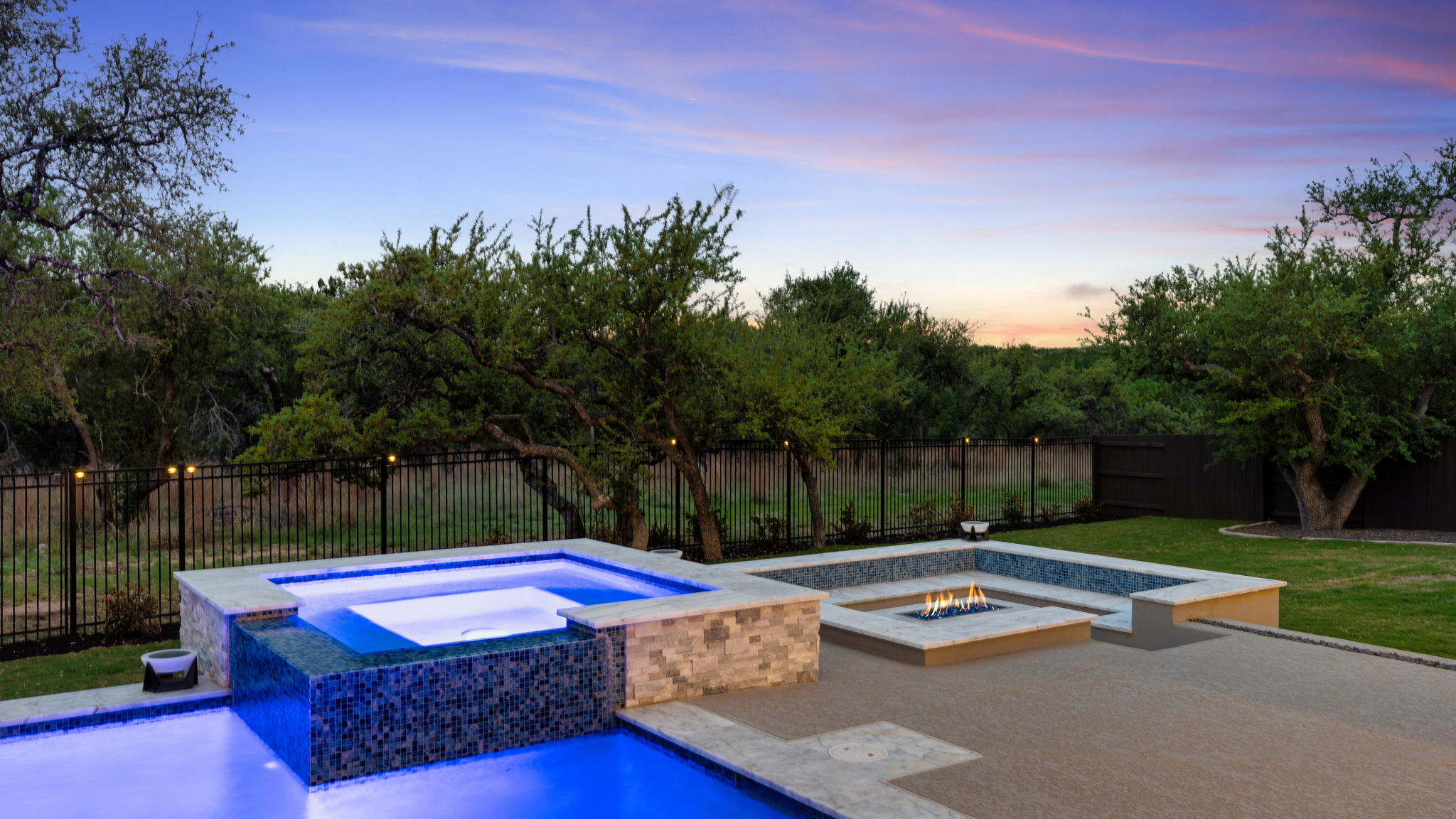 546 Bridge Water Loop Dripping Springs, TX 78620 - Photo 33 of 40 a view of swimming pool with a yard and a fountain