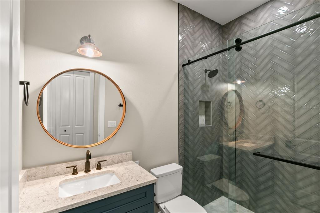 1 Plainview Road, Unit LOT 1 Odessa, FL 33556 - Photo 12 of 16 a bathroom with a sink and a mirror