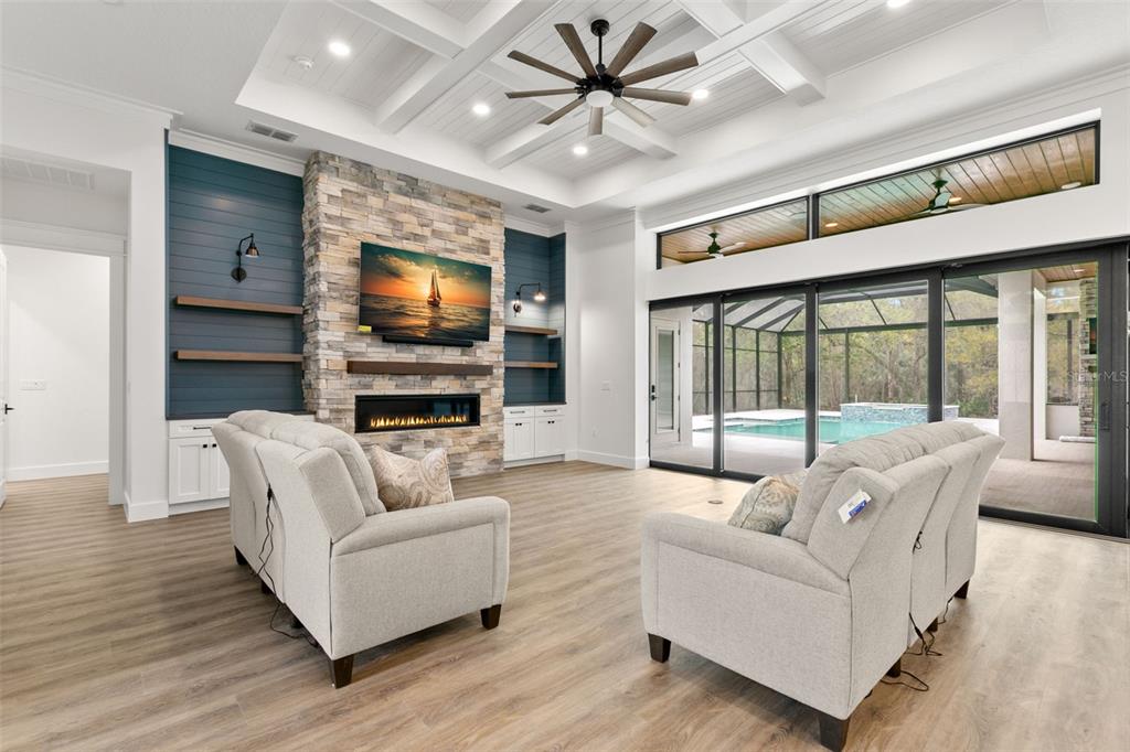 1 Plainview Road, Unit LOT 1 Odessa, FL 33556 - Photo 5 of 16 a living room with furniture and a flat screen tv