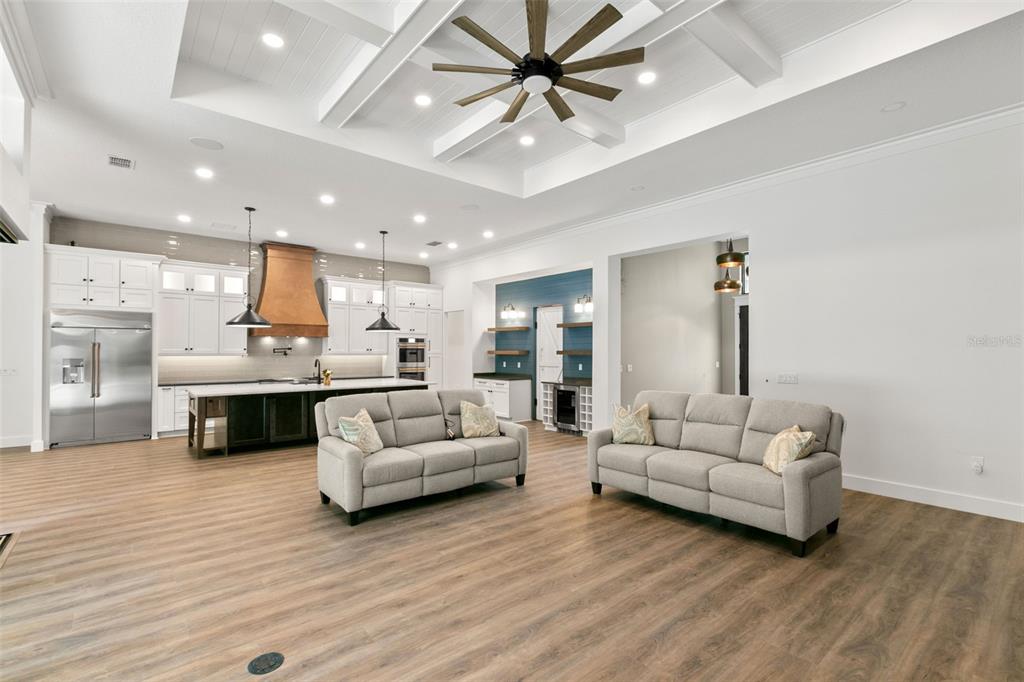 1 Plainview Road, Unit LOT 1 Odessa, FL 33556 - Photo 7 of 16 a living room with furniture and kitchen view