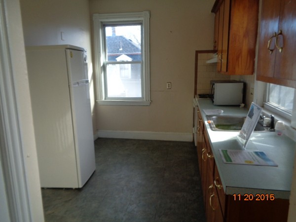 2 Albion Street Salem, MA 01970 - Photo 3 of 10 a bathroom with a sink and a mirror