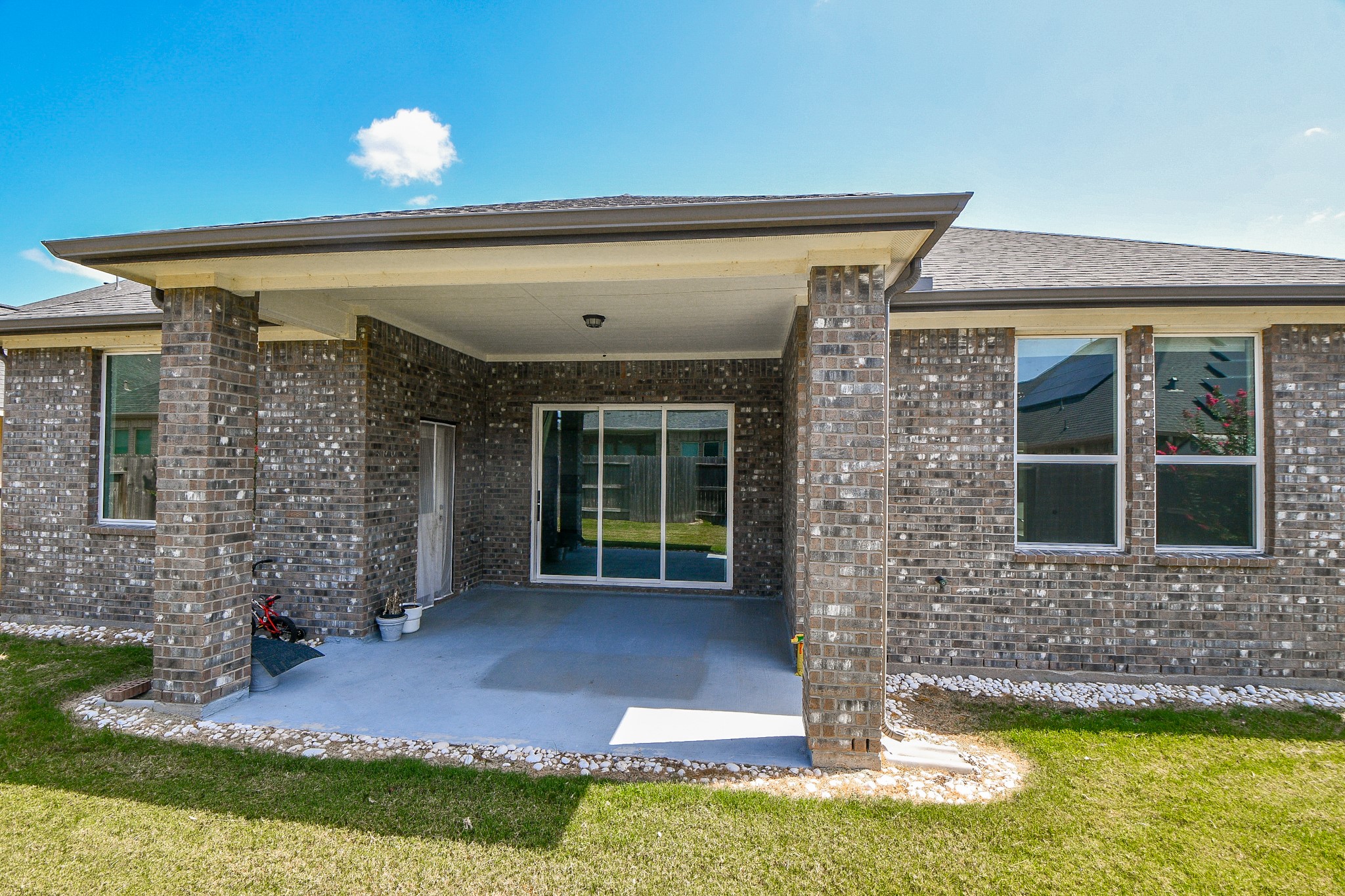 8215 Longear Lane Rosenberg, TX 77469 - Photo 3 of 23 Covered Porch with Sliding Glass Doors