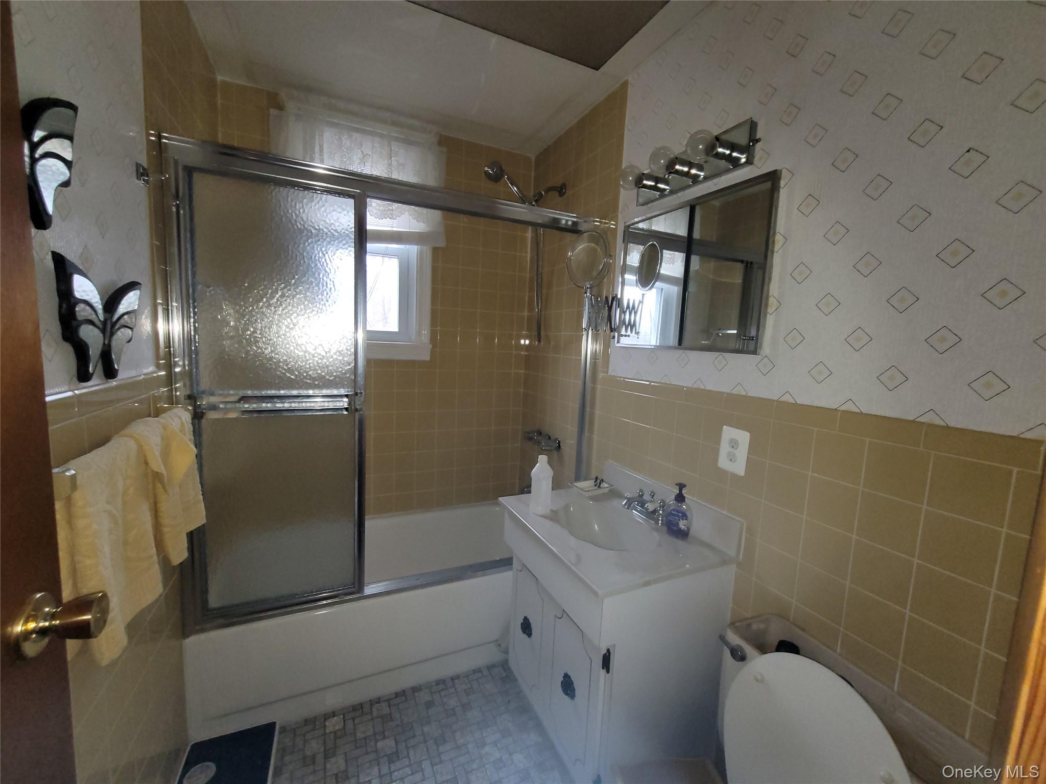 191 Hasbrouck A Road Fallsburg, NY 12747 - Photo 8 of 12 a bathroom with a sink toilet and shower