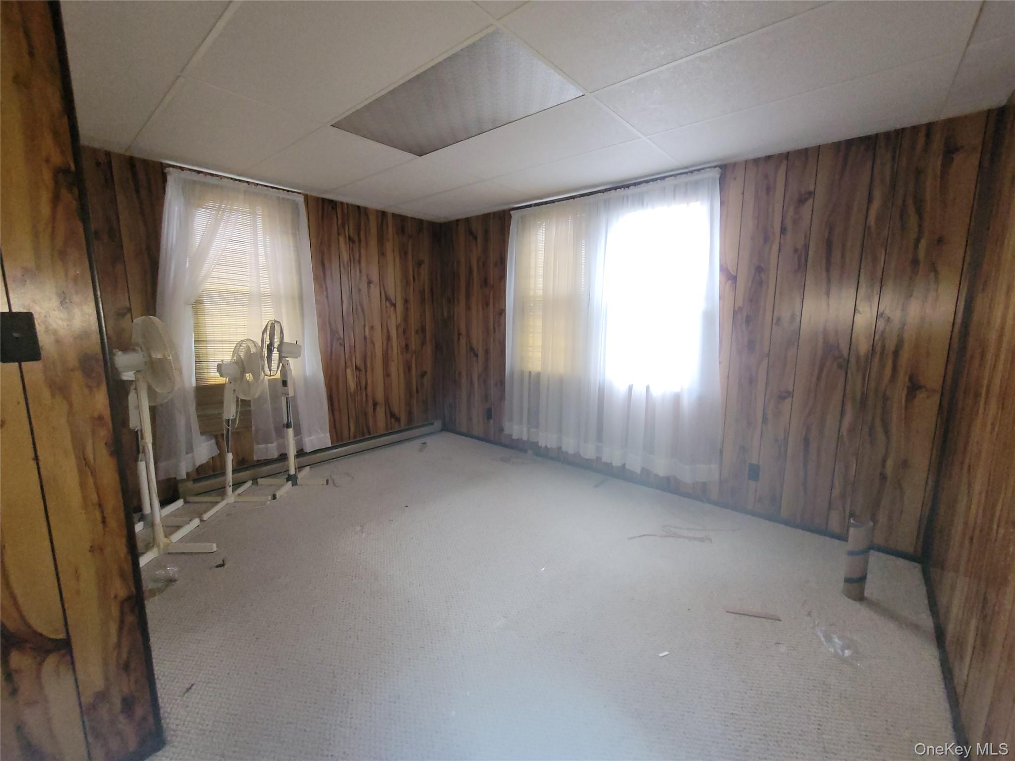 191 Hasbrouck A Road Fallsburg, NY 12747 - Photo 10 of 12 a view of an empty room with a window
