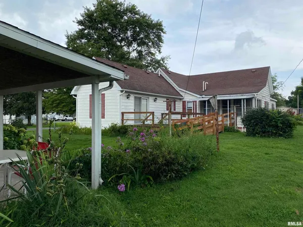 a house view with a garden space