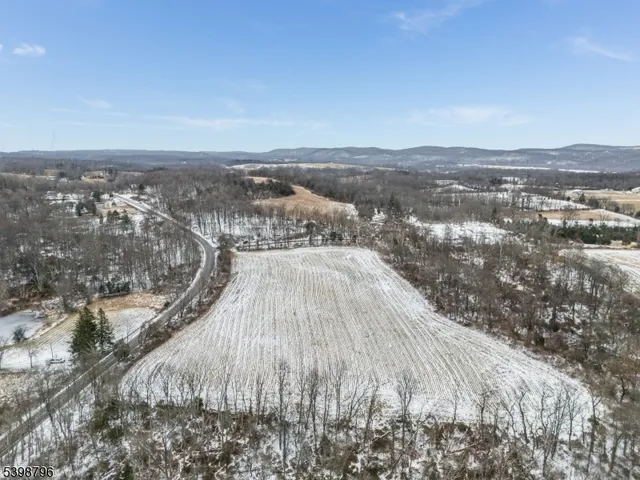 an aerial view of residential house and ocean