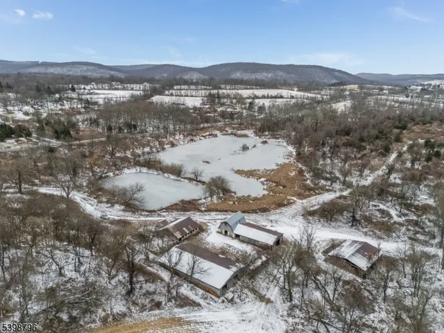 an aerial view of residential building and parking space