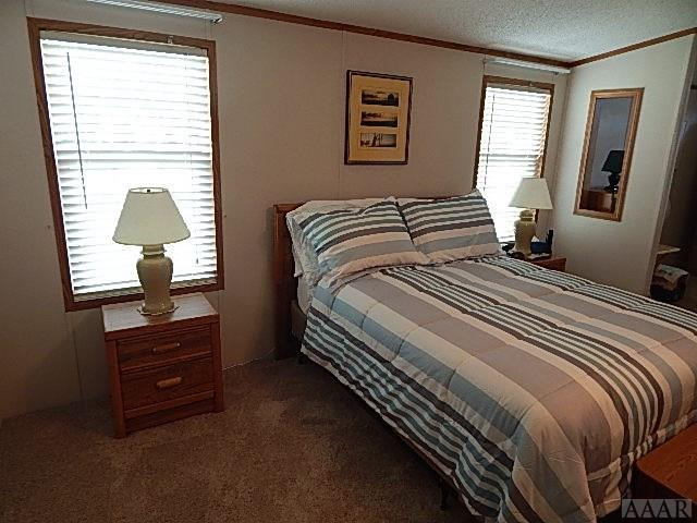 161 Worth Guard Road Coinjock, NC 27923 - Photo 15 of 40 master bedroom