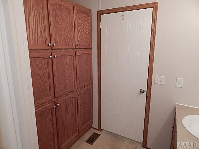 161 Worth Guard Road Coinjock, NC 27923 - Photo 25 of 40 hall bath linen closet