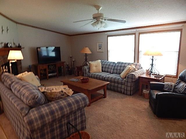 161 Worth Guard Road Coinjock, NC 27923 - Photo 3 of 40 living room 2