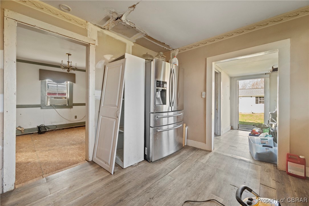 1282 Water View Road Water View, VA 23180 - Photo 11 of 49 Kitchen with stainless steel fridge and light hardwood / wood-style floors
