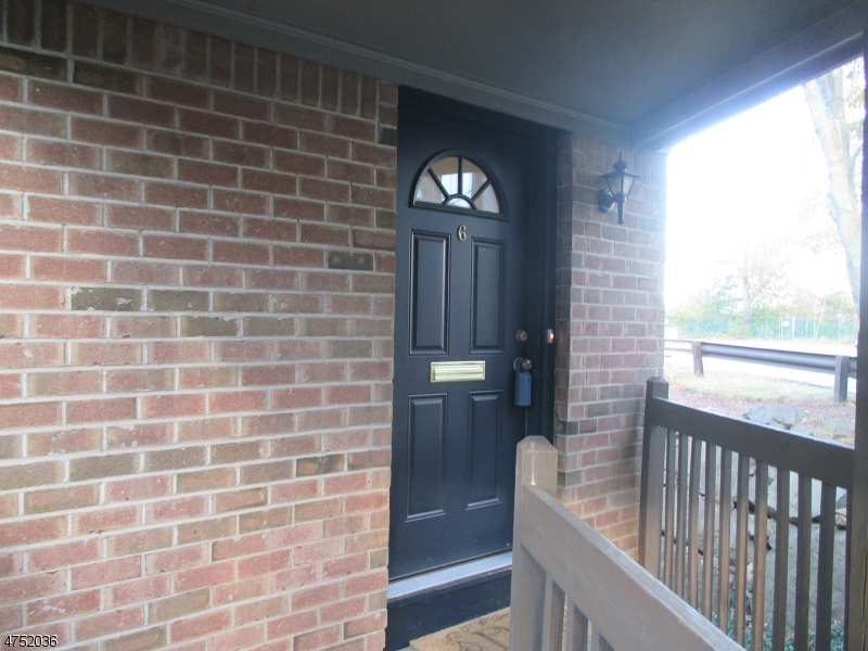 181 Long Hill Road, Unit 6 Little Falls, NJ 07424 - Photo 1 of 20 a view of a brick wall