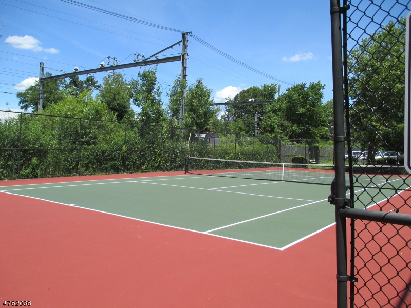 181 Long Hill Road, Unit 6 Little Falls, NJ 07424 - Photo 15 of 20 a view of a tennis court