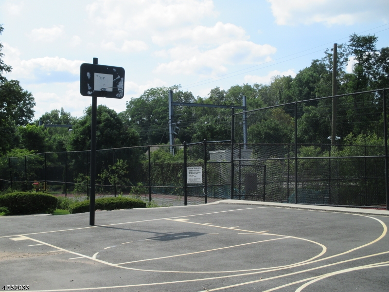 181 Long Hill Road, Unit 6 Little Falls, NJ 07424 - Photo 16 of 20 a view of a tennis court