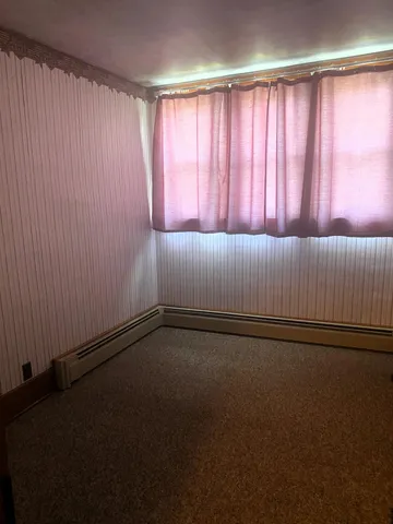a view of a room with an empty space