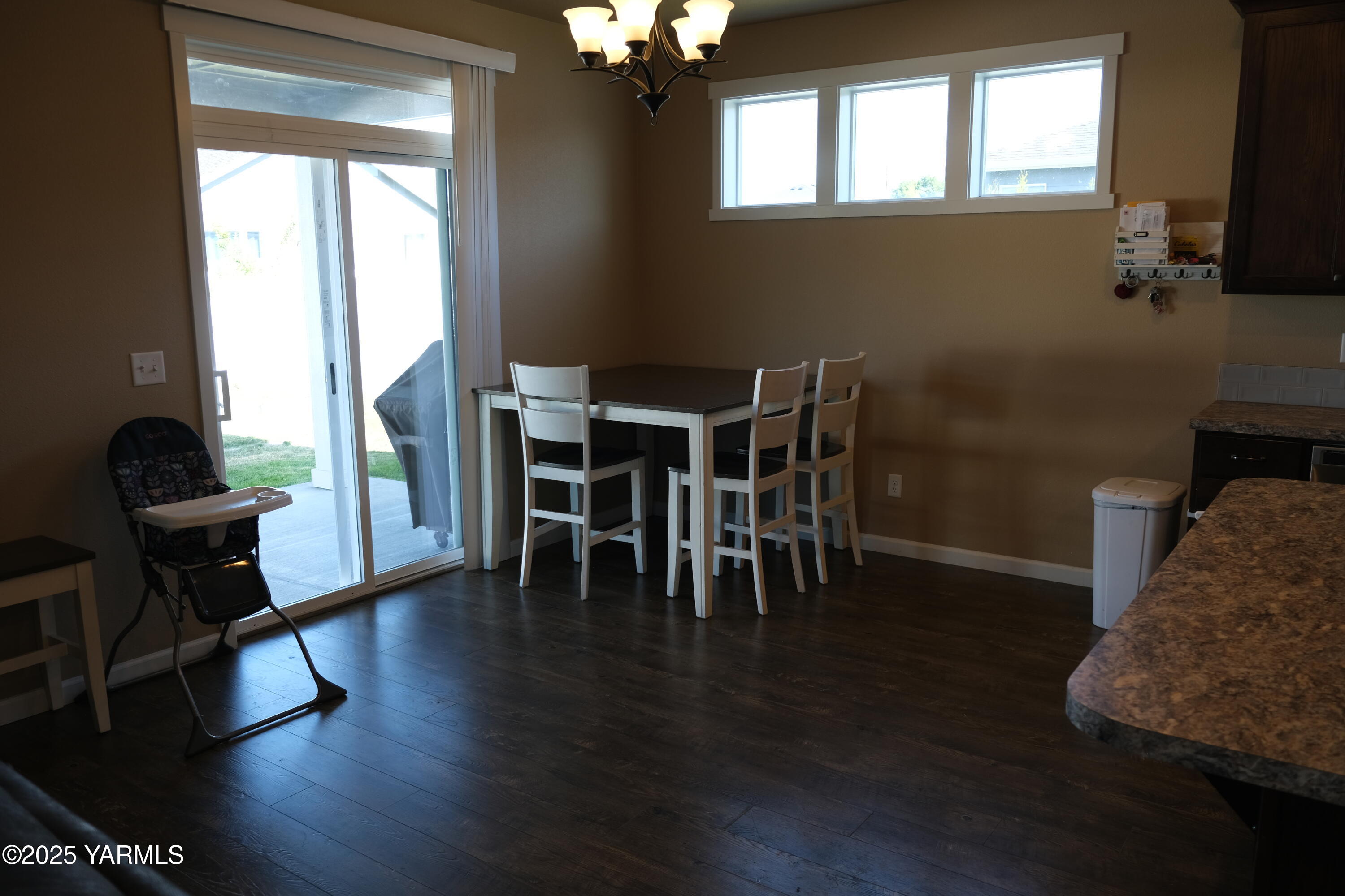 2206 Porter Loop Yakima, WA 98901 - Photo 11 of 34 a dining room with furniture and wooden floor