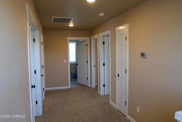 a view of hallway with a hallway