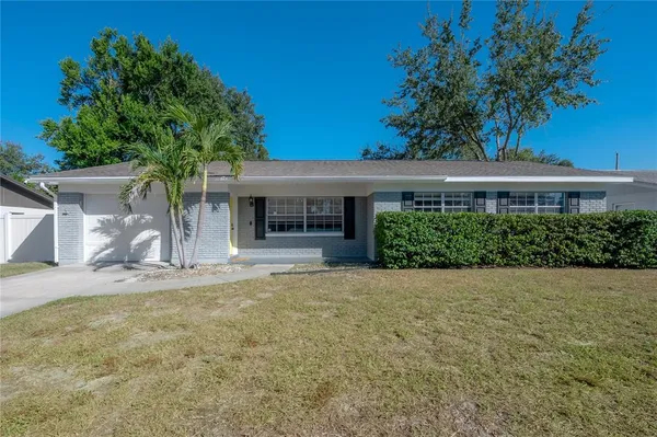 front view of a house with a yard