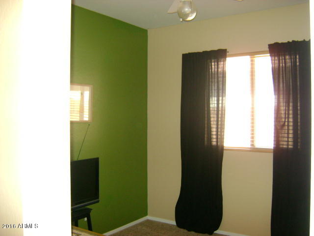 11174 West Berkeley Road Avondale, AZ 85392 - Photo 10 of 41 a bathroom with a toilet