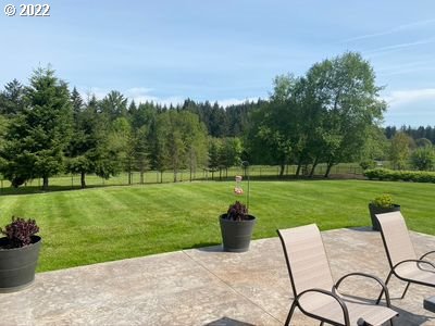 5606 Northwest 280th Street Ridgefield, WA 98642 - Photo 29 of 32 a view of a garden and patio