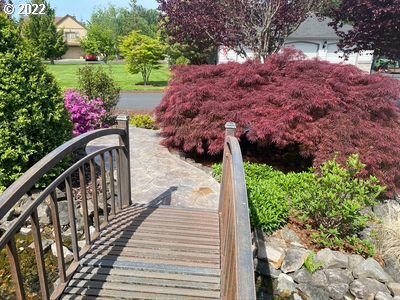 5606 Northwest 280th Street Ridgefield, WA 98642 - Photo 31 of 32 a view of a pathway with a garden