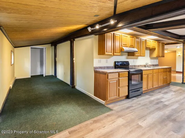 a view of a livingroom with wooden floor