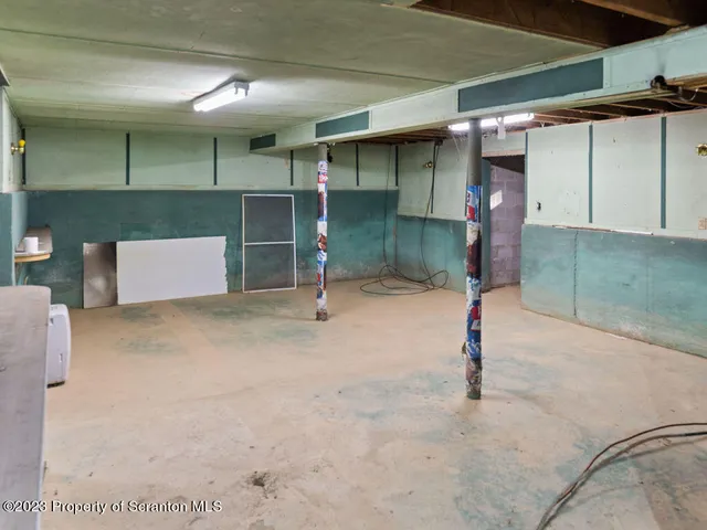 a open kitchen with a refrigerator a stove top oven a sink and dishwasher