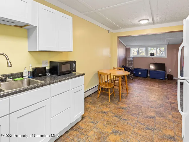 a view of a chairs with table in the patio