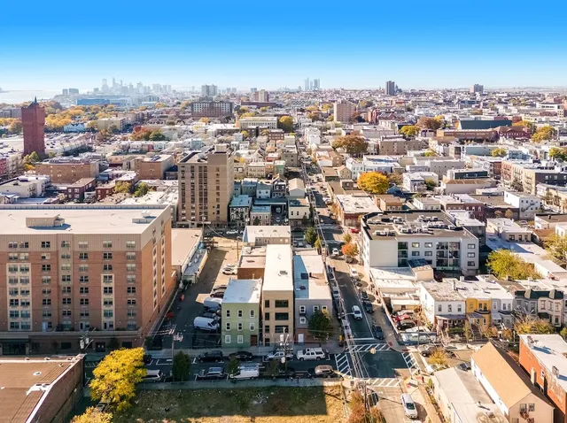 a view of a city with tall buildings