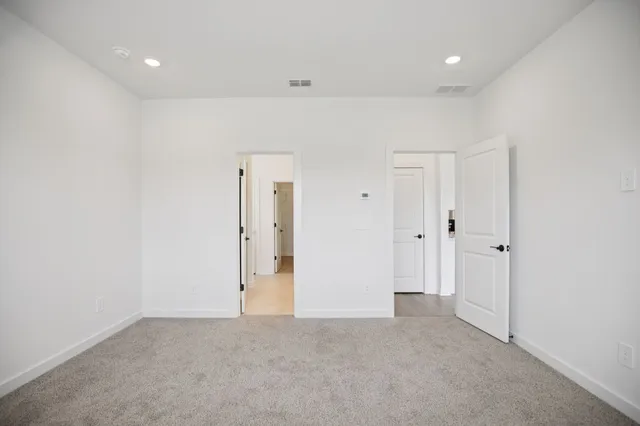 a view of lake with green space