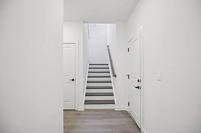 a view of room with hardwood floor