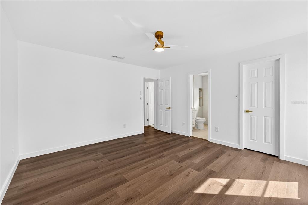 662 Bryan Terrace Drive Brandon, FL 33511 - Photo 12 of 30 a view of empty room with wooden floor