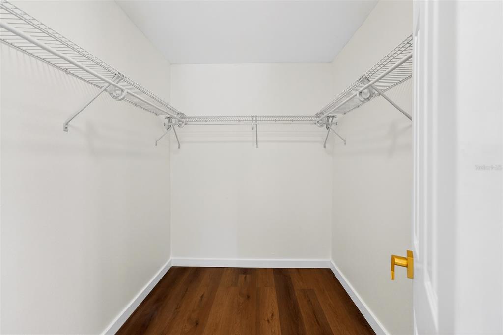 662 Bryan Terrace Drive Brandon, FL 33511 - Photo 15 of 30 a view of walk in closet with empty racks