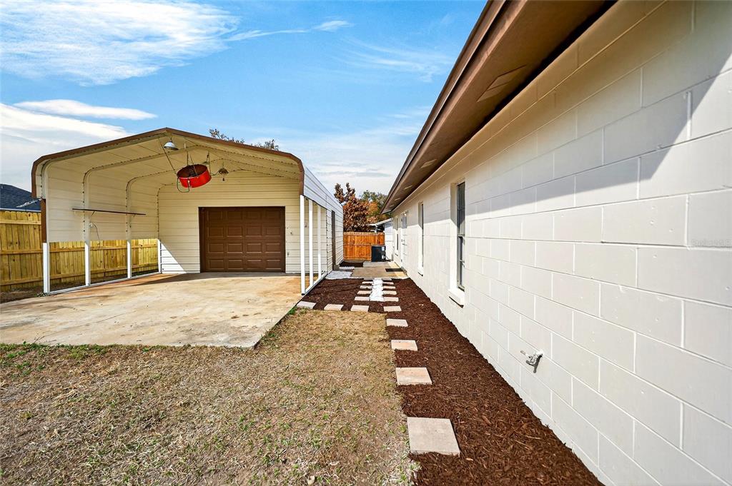 662 Bryan Terrace Drive Brandon, FL 33511 - Photo 22 of 30 a front view of a house with a garage