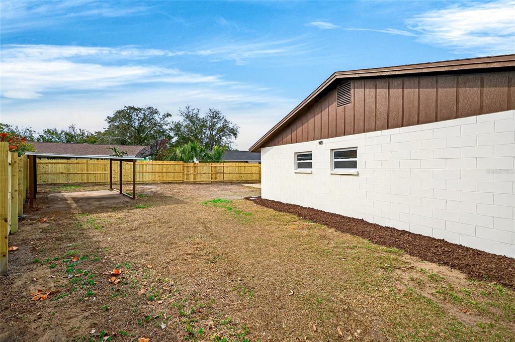 662 Bryan Terrace Drive Brandon, FL 33511 - Photo 26 of 30 a view of house with backyard