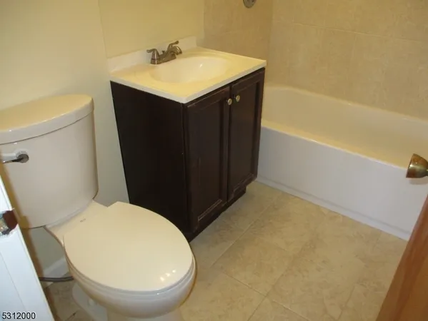 a bathroom with a sink and a bathtub