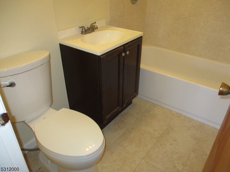 777 Springfield Avenue, Unit 17 Summit, NJ 07901 - Photo 23 of 25 a bathroom with a sink and a toilet