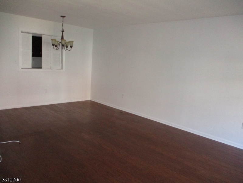 777 Springfield Avenue, Unit 17 Summit, NJ 07901 - Photo 7 of 25 en empty room with windows