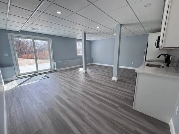 a view of a livingroom with wooden floor