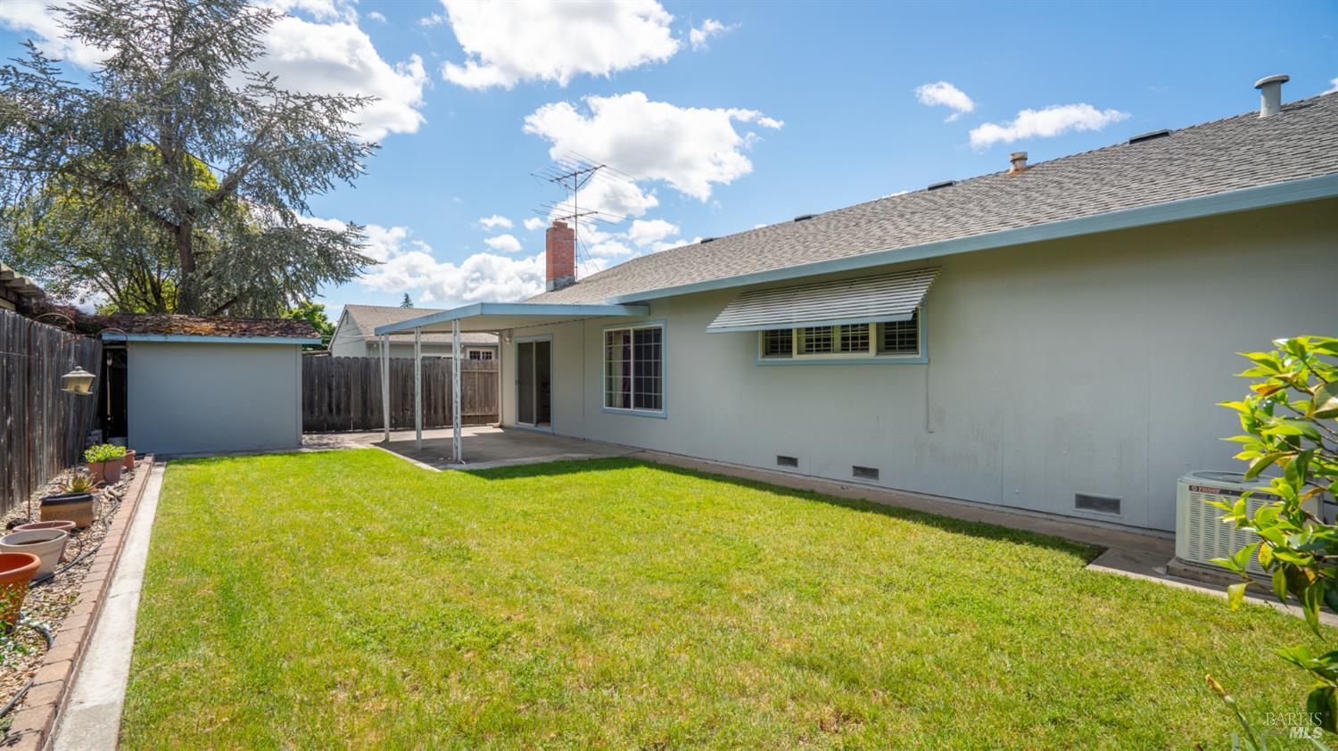 1536 Sunview Court Santa Rosa, CA 95401 - Photo 22 of 28 a view of a house with swimming pool and a yard