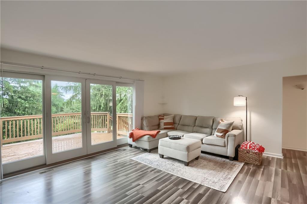 5607 McCormick Road Pittsburgh, PA 15205 - Photo 12 of 33 a bedroom with furniture and a large window