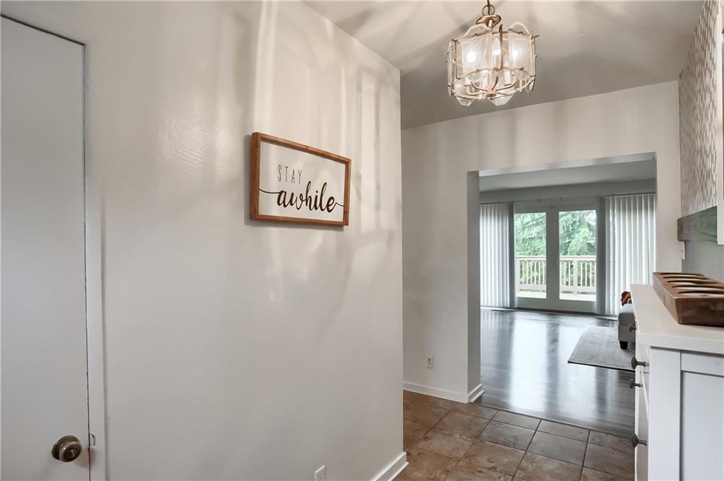 5607 McCormick Road Pittsburgh, PA 15205 - Photo 2 of 33 a view of a hallway with a chandelier