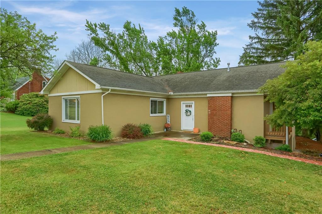5607 McCormick Road Pittsburgh, PA 15205 - Photo 27 of 33 front view of a house with a yard