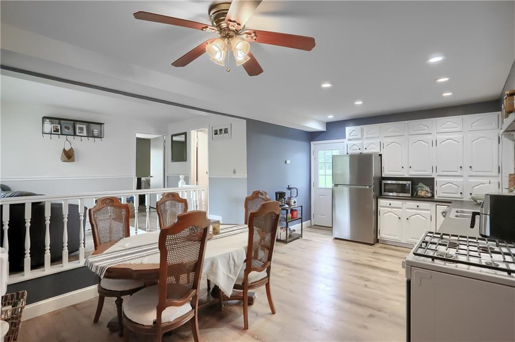 5607 McCormick Road Pittsburgh, PA 15205 - Photo 5 of 33 a view of a dining room with furniture and wooden floor