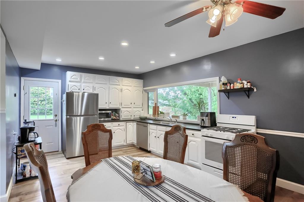 5607 McCormick Road Pittsburgh, PA 15205 - Photo 10 of 33 a kitchen with stainless steel appliances granite countertop a refrigerator sink and stove