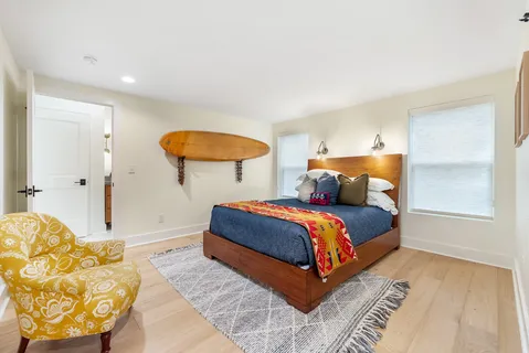 a bathroom with a toilet and a bathtub