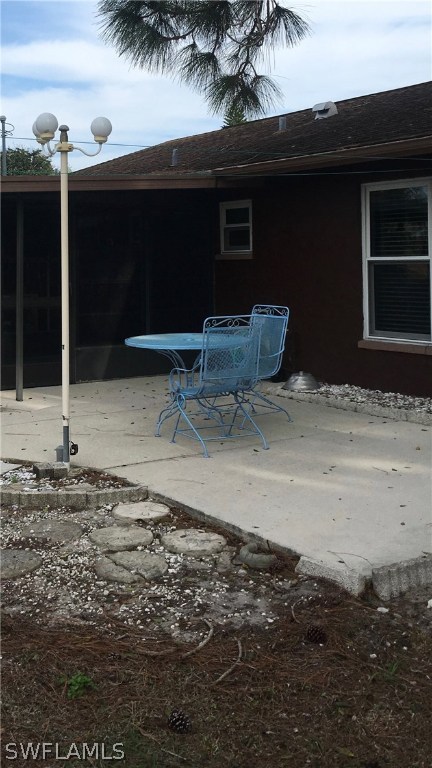 7259 Buchanan Road Fort Myers, FL 33967 - Photo 12 of 13 a backyard of a house