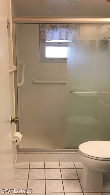 7259 Buchanan Road Fort Myers, FL 33967 - Photo 6 of 13 a bathroom with a white toilet and a shower