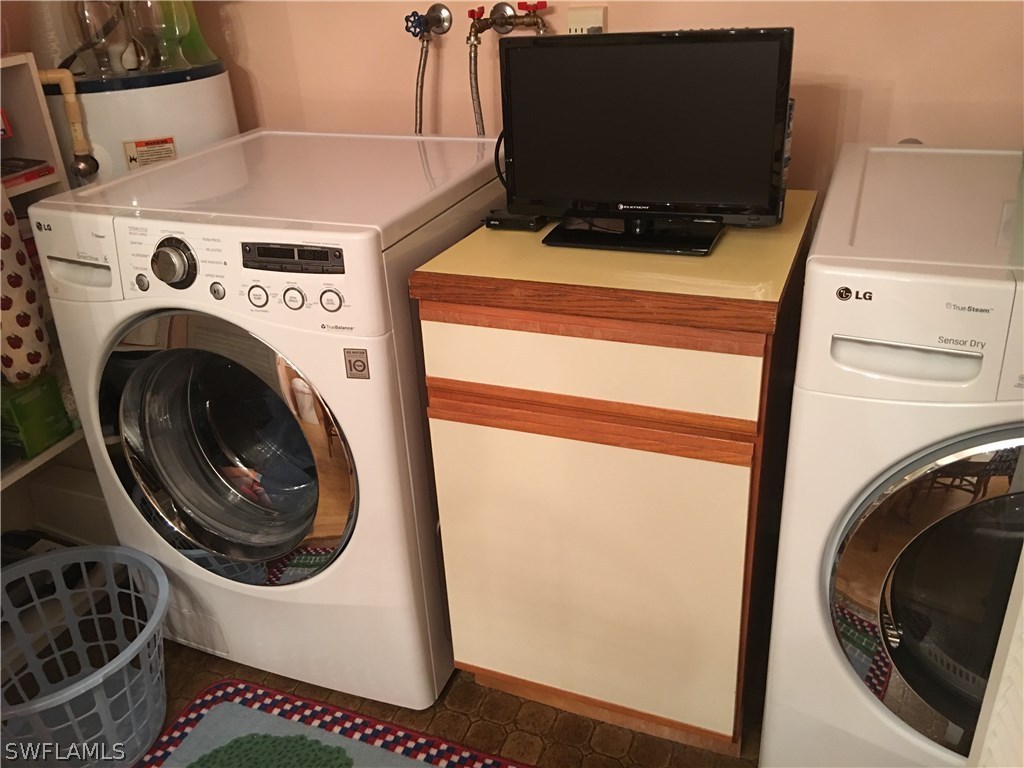 7259 Buchanan Road Fort Myers, FL 33967 - Photo 7 of 13 a utility room with dryer and washer