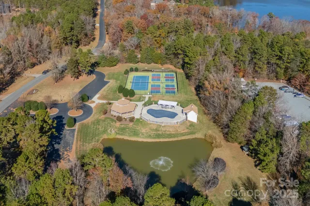 a view of a garden with an outdoor seating